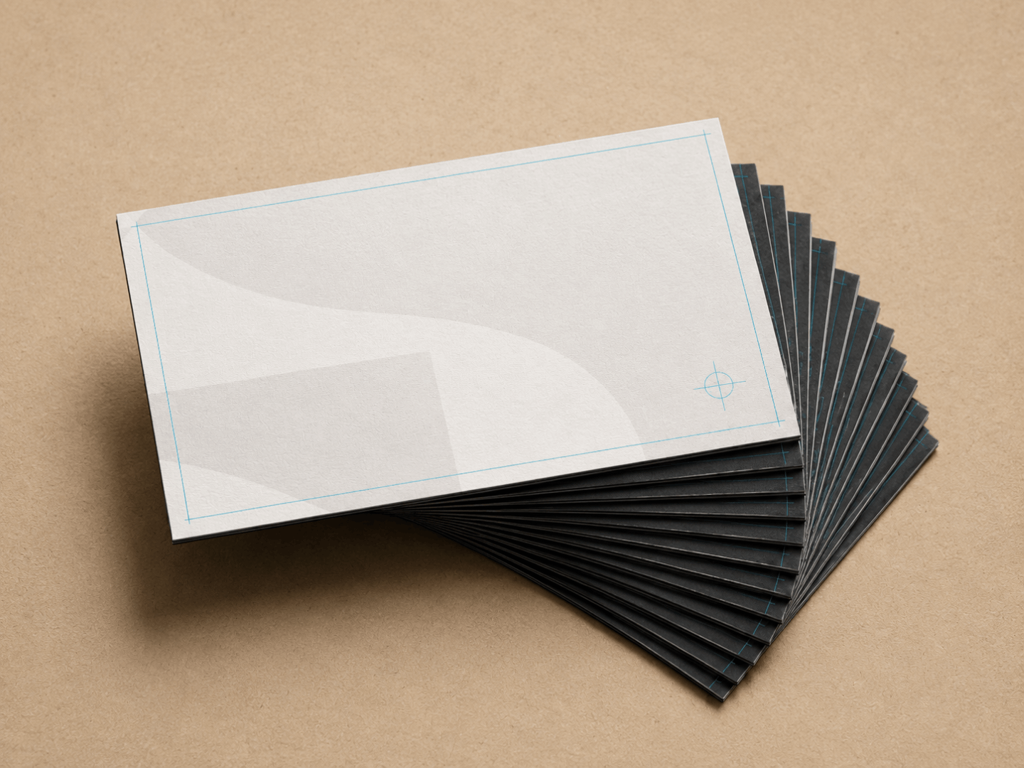 A stack of blank business cards with crop marks and bleed guides shown on the top card
